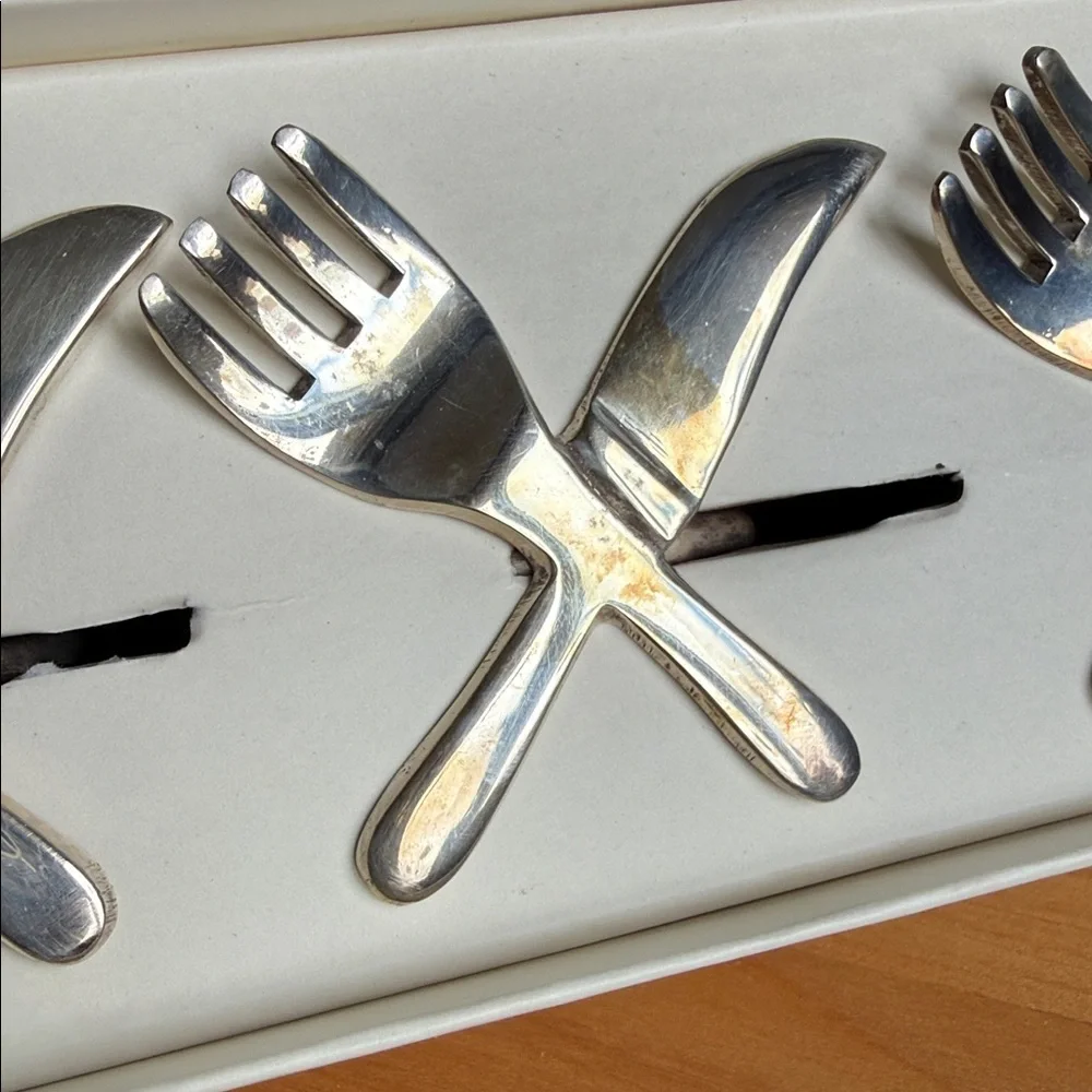 NWT Pier 1 Imports Silver Plated Silverware Fork Knife Napkin Rings Set of 4 NIB